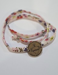 "Detente" Wrap Pulsera/gargantilla · Disco acero y cordón tela flores
