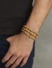 Rosario pulsera olivo claro San Benito elástico granos ovalados
